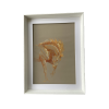 "Rio" in its white frame
