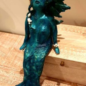'Siren' by Gayle Lockley, a green clay sculpture of a mermaid