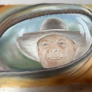 'Reflection of the Soul' by Lynda Page-Bickley, a drawing of a reflection of a smiling farmer in the eye of a cow